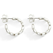 Primo piano degli orecchini Dodo DOC5000 con finitura lucida e forma a cuore.