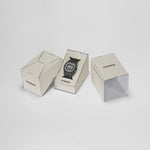 Load image into Gallery viewer, Casio G-shock Serie 5600 DW-5600RGM-1ER - cinturino e cassa neri con dettagli bianchi - quadrante digitale nero - box