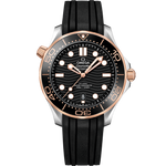 Load image into Gallery viewer, Quadrante blu lucido in ceramica con motivo a onde inciso al laser e indici luminosi dell’Omega Seamaster Diver 300M 42 mm modello 210.22.42.20.01.002 con cinturino in caucciù blu.
