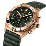 Load image into Gallery viewer, Dettaglio del cinturino in caucciù verde con fibbia pieghevole in oro rosso 18 carati dell’orologio Breitling Chronomat.
