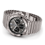 Load image into Gallery viewer, Vista laterale della cassa titanio con lunetta unidirezionale e vetro zaffiro bombato dell’orologio Breitling Chronomat.
