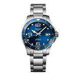 Load image into Gallery viewer, Quadrante blu a raggi di sole con numeri arabi 6, 9, 12 e indici applicati, lancette argentate lucide con trattamento Swiss Super-LumiNova® e datario a ore 3 dell&#39;orologio Longines HydroConquest automatico
