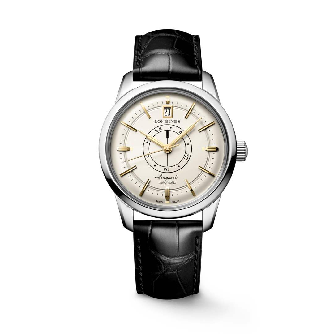 Quadrante champagne del Longines Conquest Heritage Central Power Reserve con indici applicati, lancette dorate e indicatore centrale della riserva di carica, trattate con Swiss Super-LumiNova®